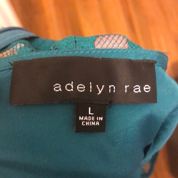 Lace dress with peek-a-boo bodice - Picture 2 of 5